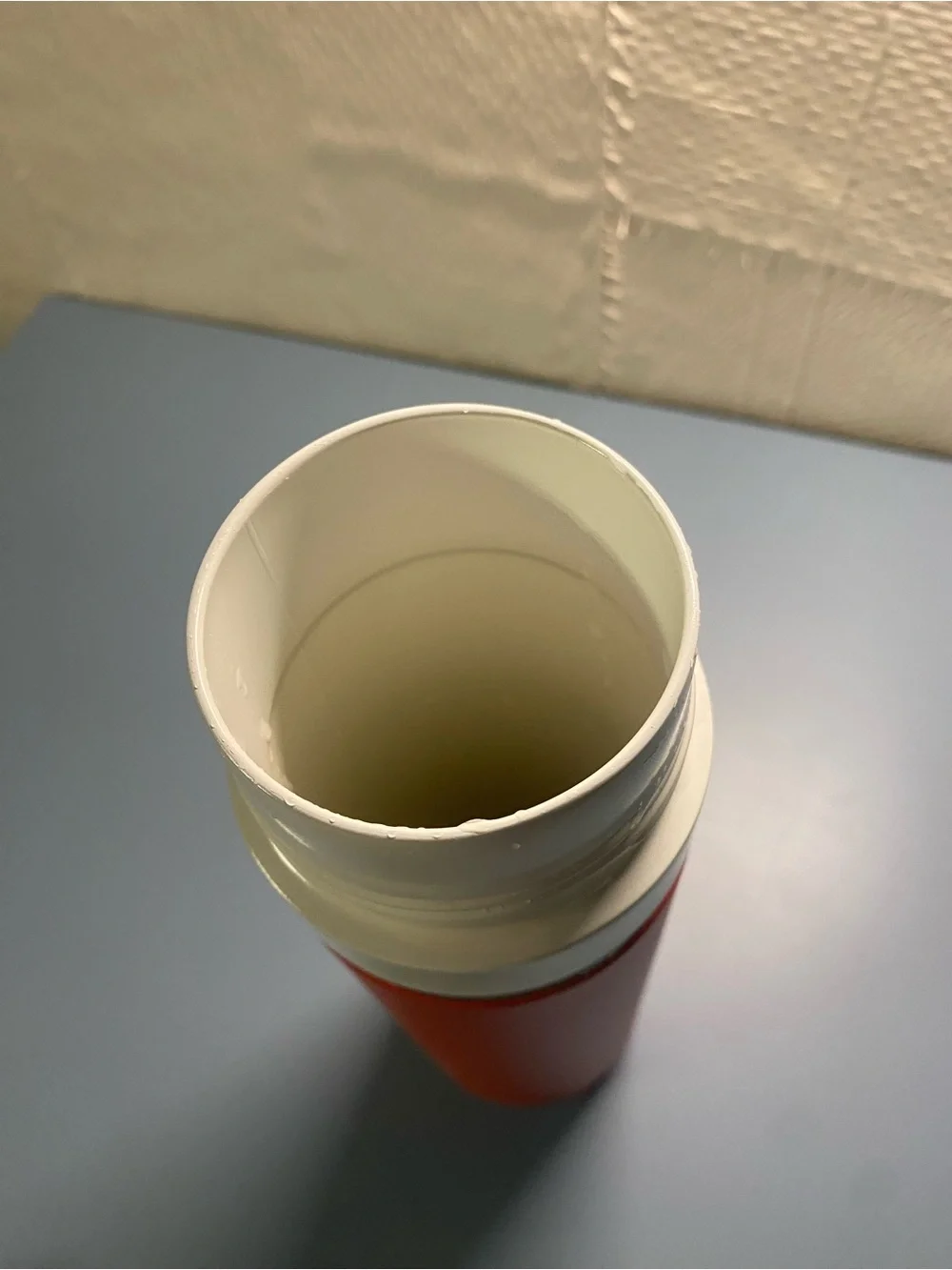 Stanley Orange Tumbler with Black Lid and White Band